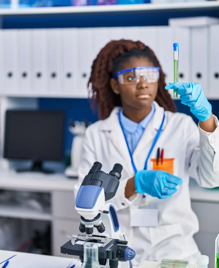 african-american-woman-scientist-holding-test-tube-laboratory